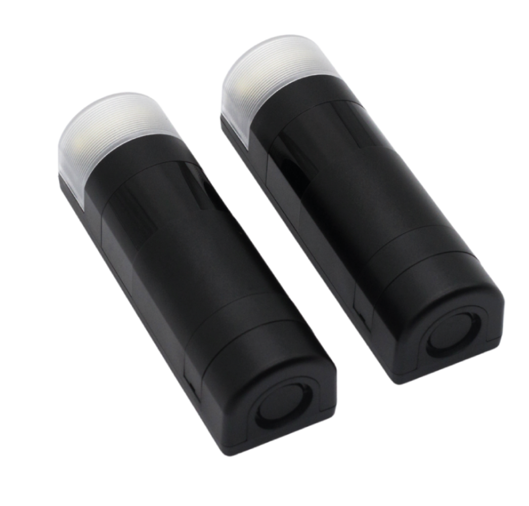 DS078A BEAM FLASH - fotobuňky s nastavitelnou optikou 180° a dosahem 30 m, vestavěná výstražná LED lampa